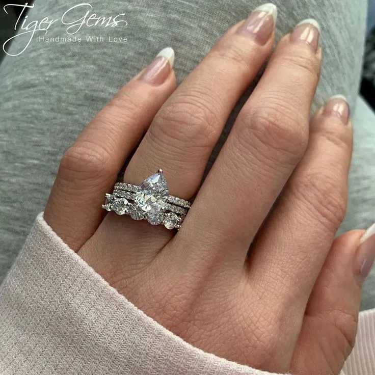 2 ctw Pear Accented Solitaire Set