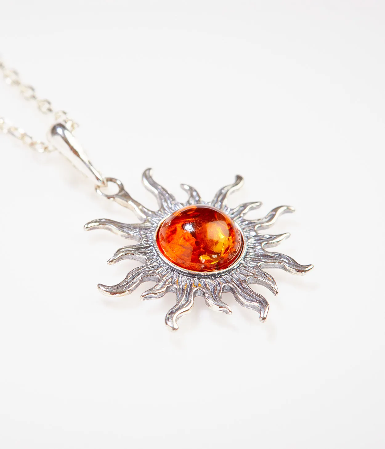 Amber Sun Charm Pendant - Radiant Baltic Amber & Intricate Sterling Silver, 45cm Anchor Chain