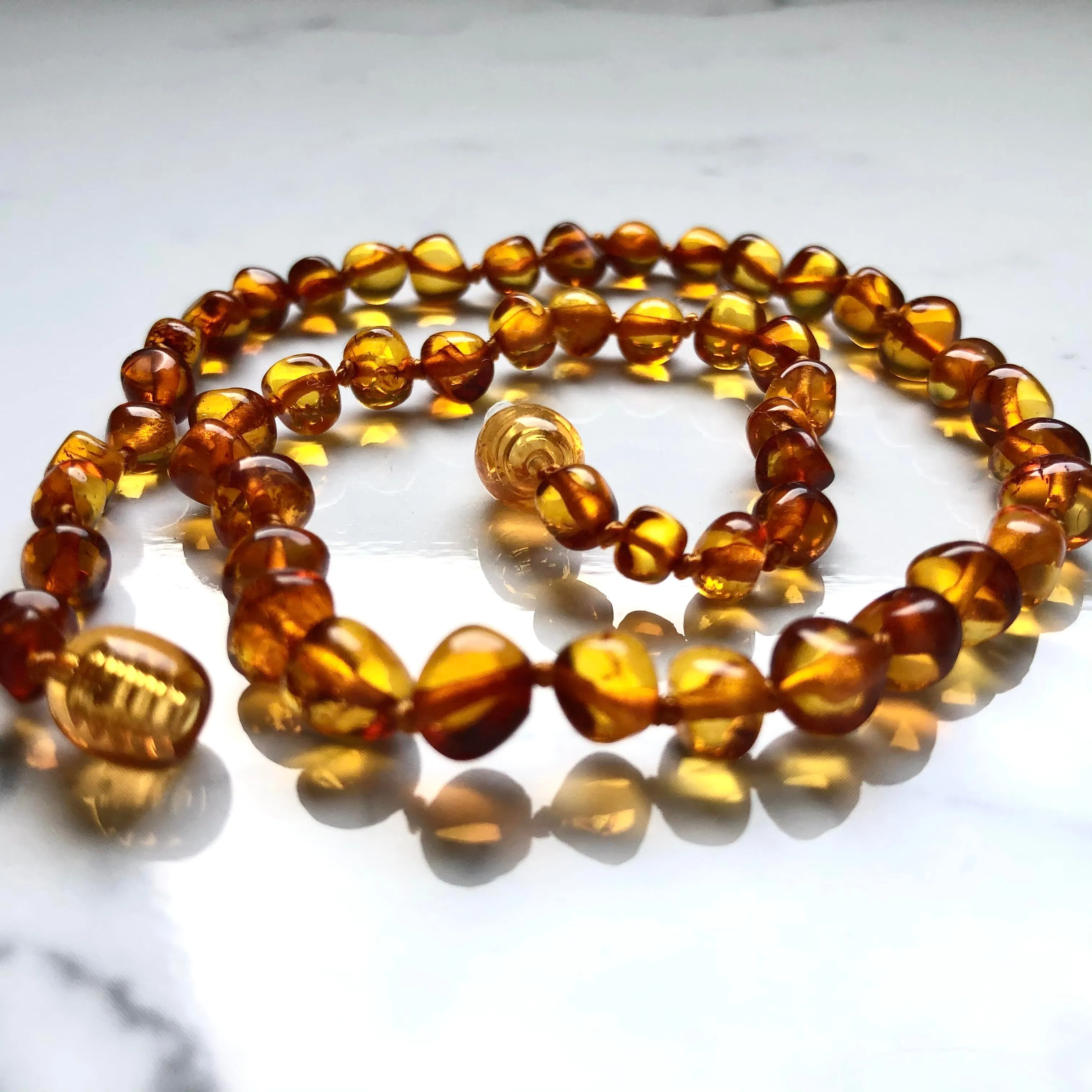 Amber Teething Necklace for Babies and Toddlers - Natural Solution for Teething Pain Relief