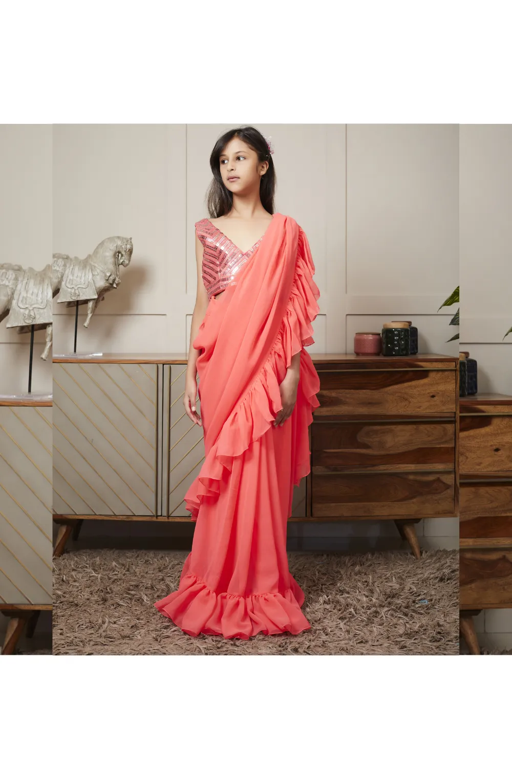 Coral Peach Ruffled Saree With Sequin Embroidered Blouse