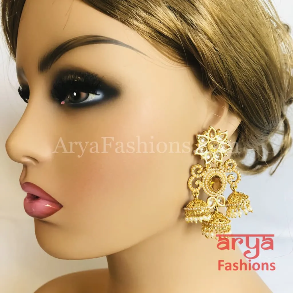 Golden Jhumka Earring with Pearls and Champagne Stones