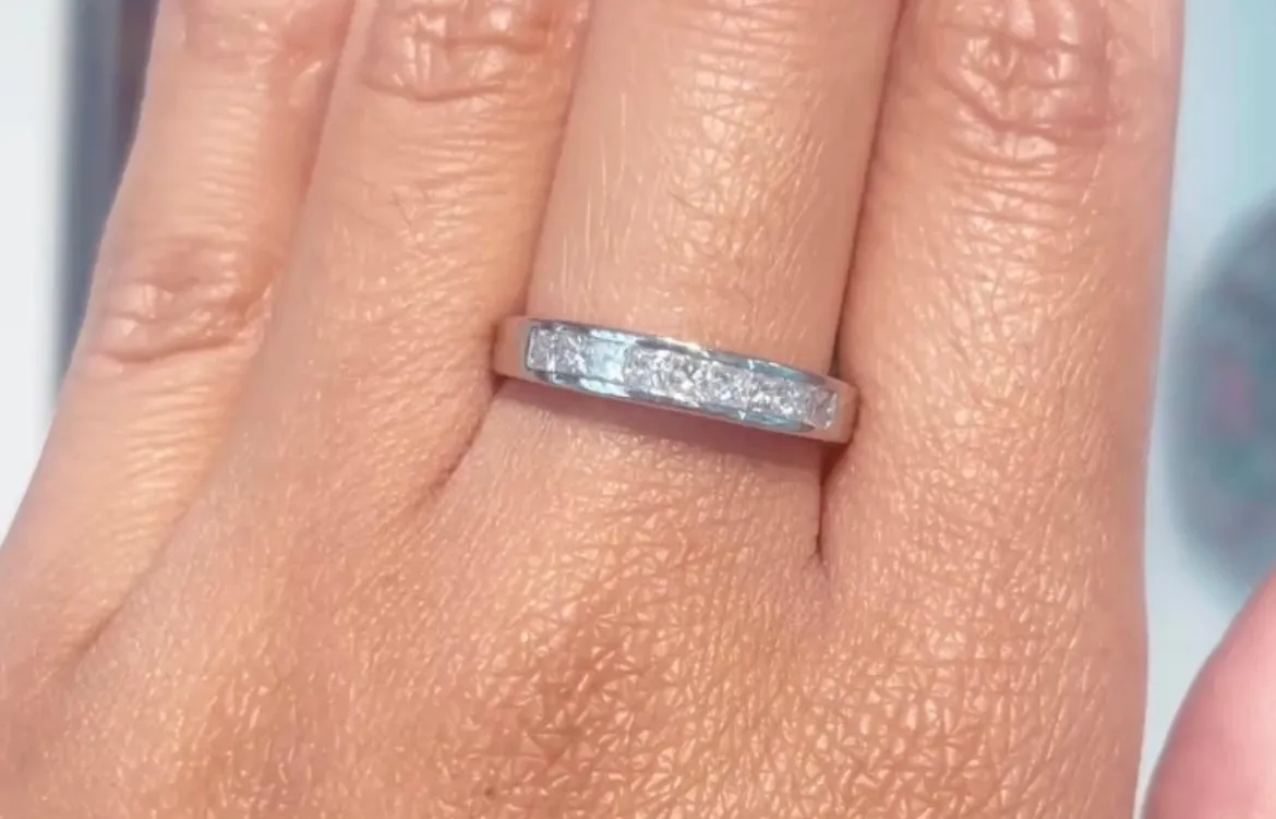 Platinum half eternity band with princess cut diamonds